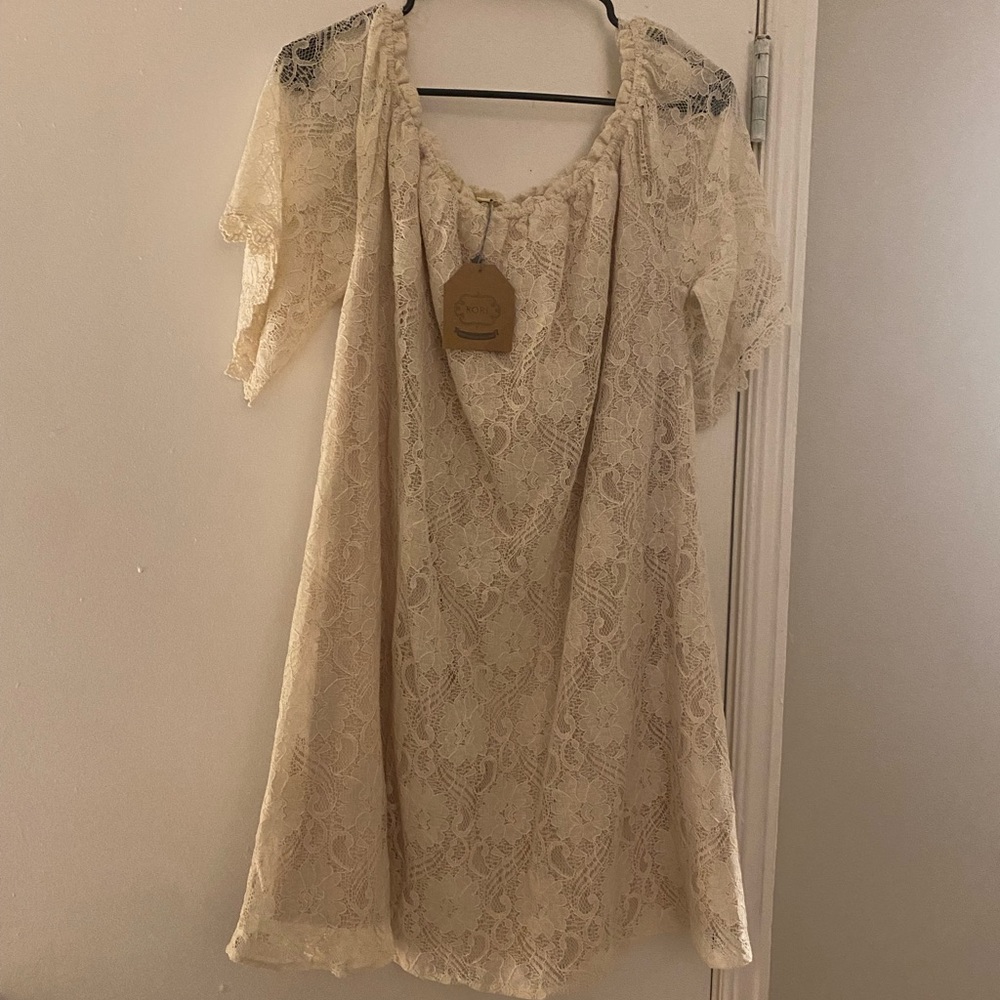 Lace dress in cream. From a Miami boutique. I paid $60, but it's yours for $40.